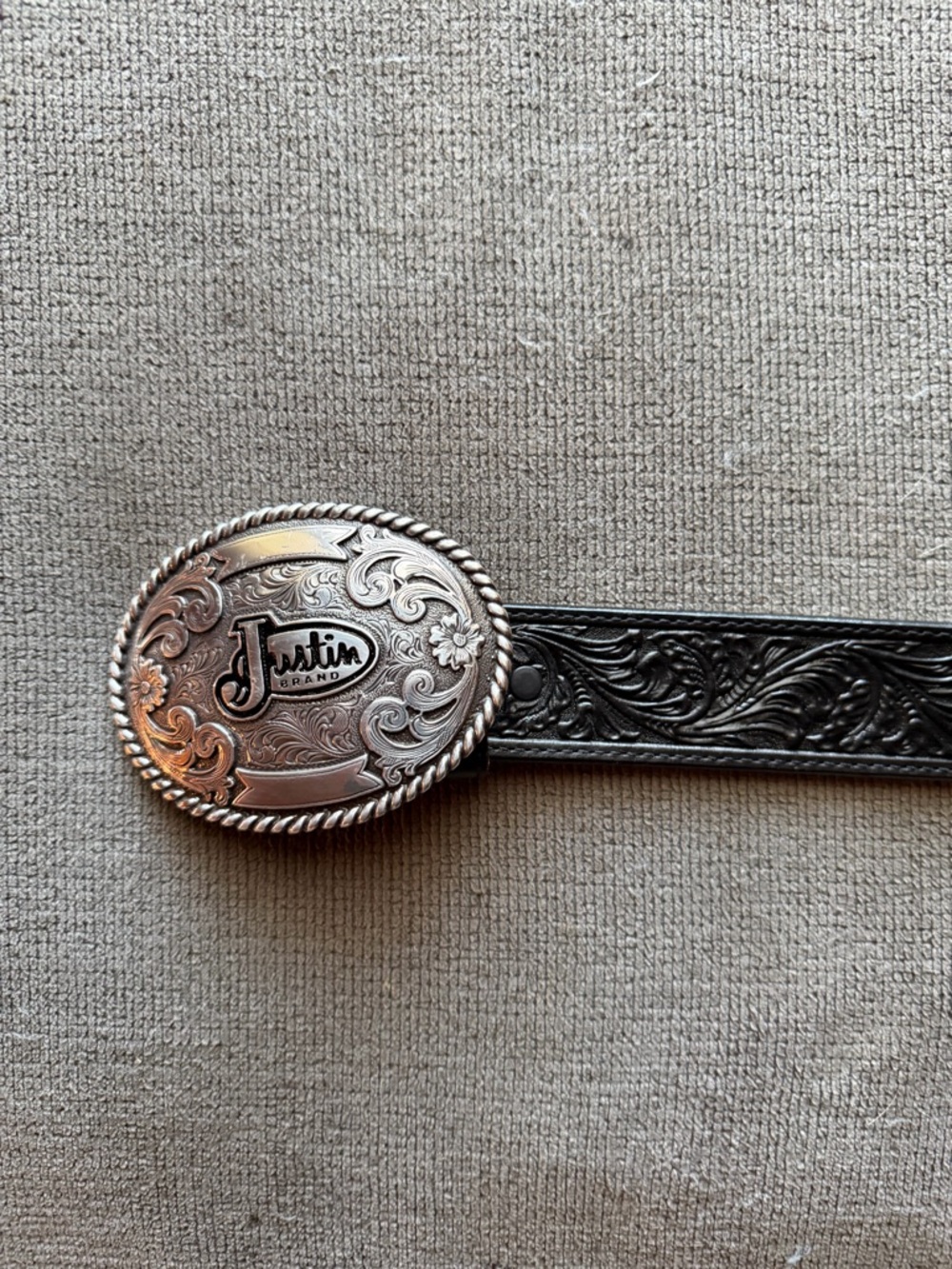 Justin Brand Silver Oval Western Buckle with Black Tooled Leather Belt